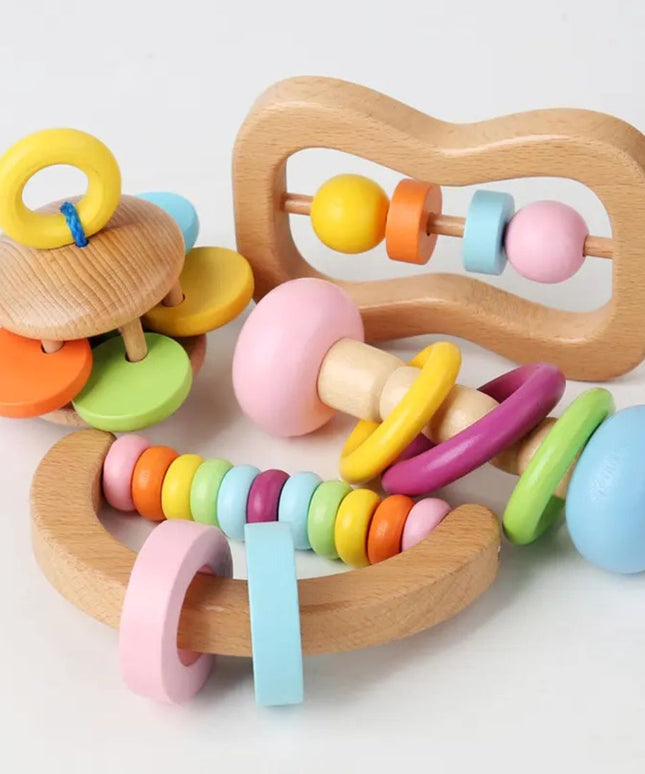 Set 4 jucării senzoriale din lemn, 6 luni+