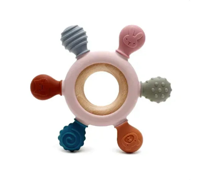 Jucărie de Dentiție Multisenzorial - Inel de dentiție din lemn și silicon - Roz pal. 0+ - Bebeboo - Totul pentru copii. Jucării, Hăinuțe, Perne, Mobilier, Textile