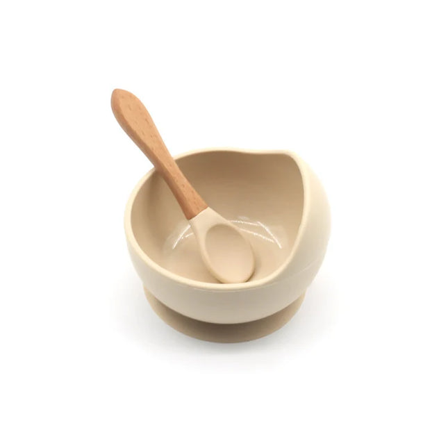 Set diversificare bebelusi  din silicon (bol si lingurita cu maner din lemn)  – Sand, 6 luni +