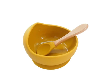 Set diversificare bebelusi  din silicon (bol si lingurita cu maner din lemn)  – Mustard, 6 luni +